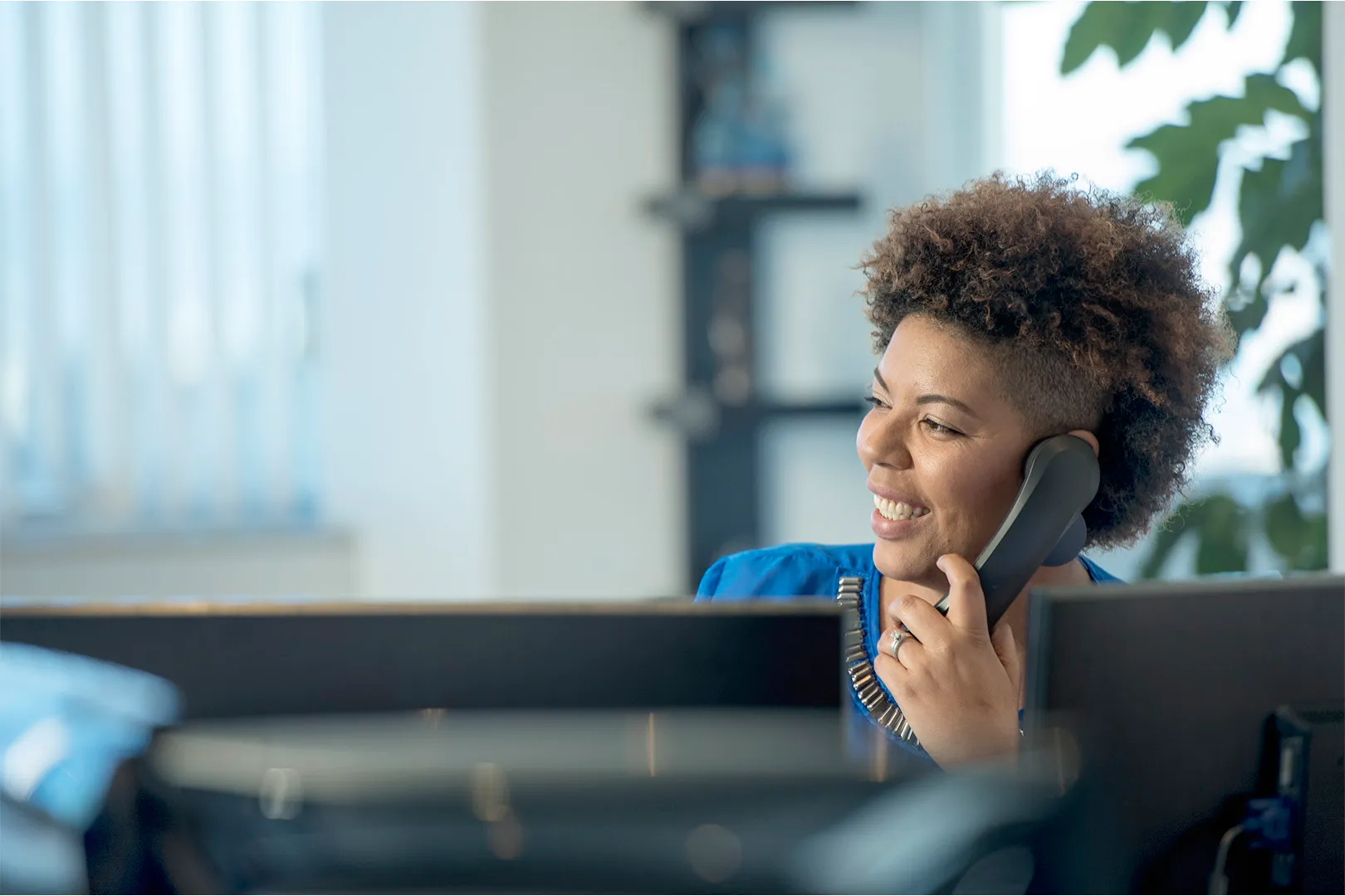 Smiling Customer Support Representative